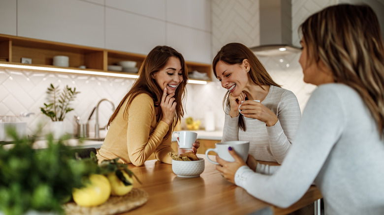 Friends having coffee together