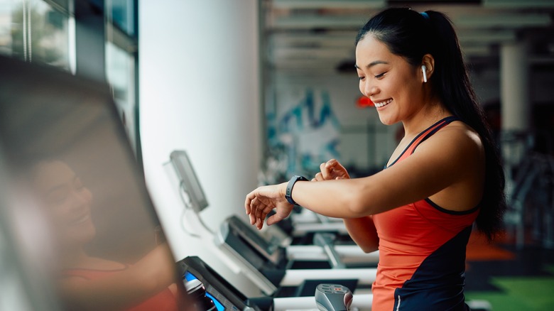 Asian woman on a treadmill
