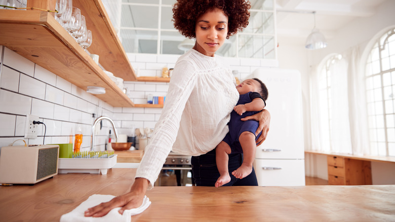 Woman with baby wipes counter