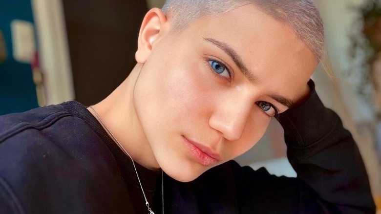 Woman with silver buzz cut