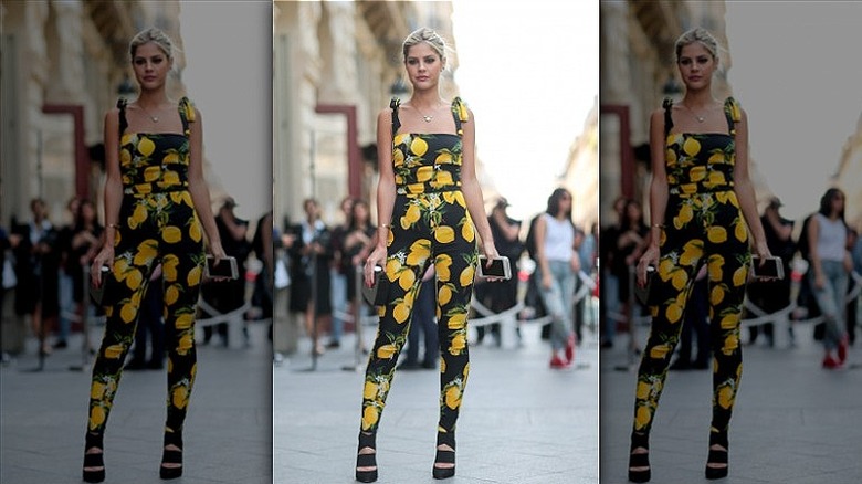 woman wearing lemon print jumpsuit