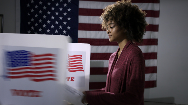 woman voting on election day