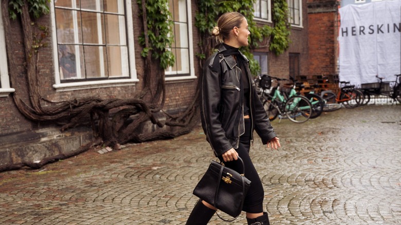 woman wearing leather jacket