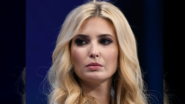 Ivanka Trump with over-the-top makeup sitting on a panel discussion in 2019.