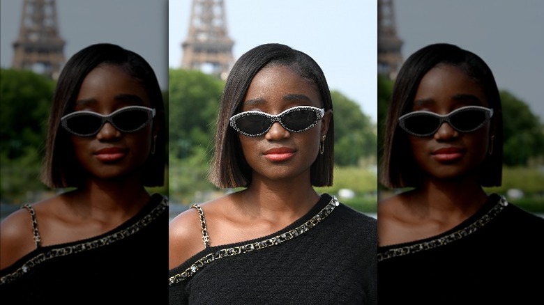 Karidja Toure in front of Eiffel Tower