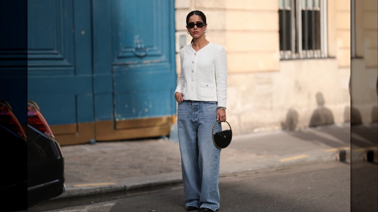 White sweater baggy jeans