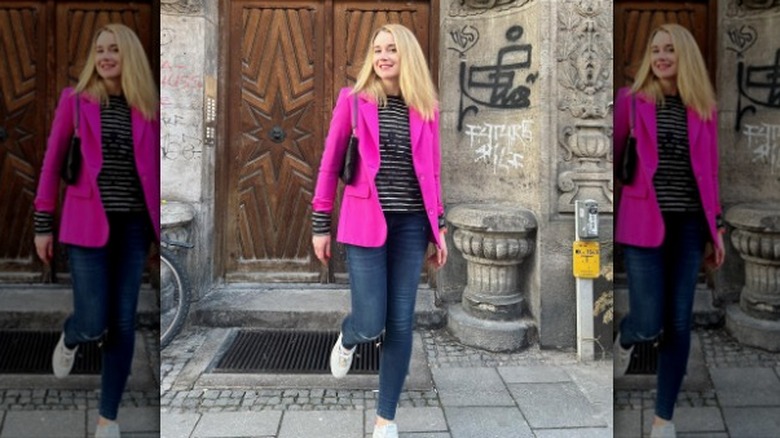 Pink blazer and dark jeans