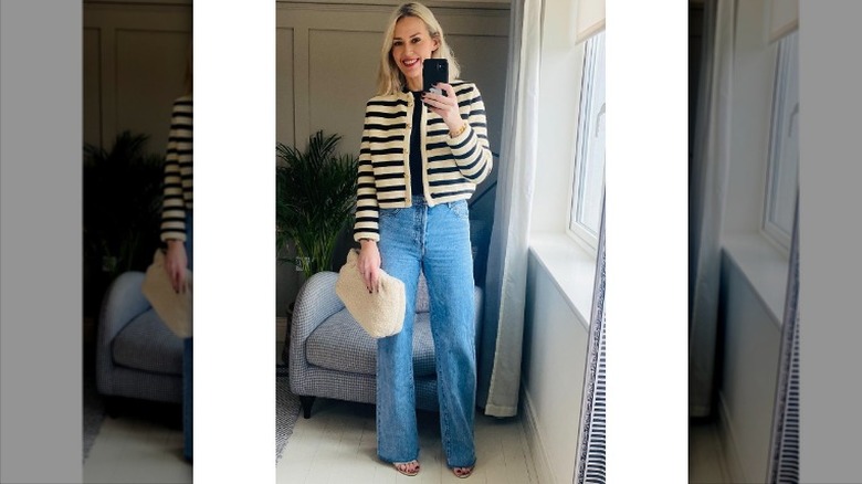 Jacket with stripes and blue jeans