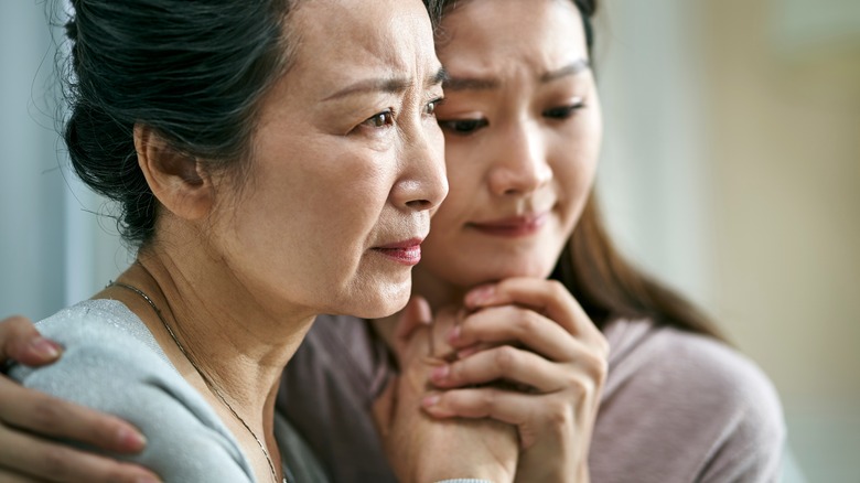 two women devastated