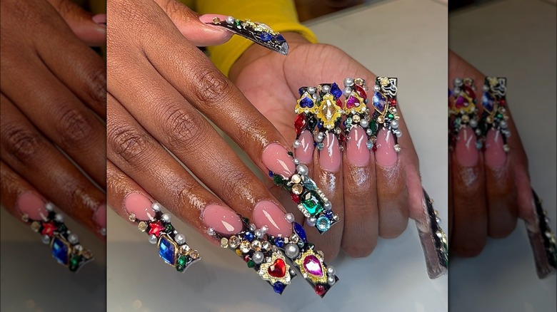 Junk manicure with jewel adornments