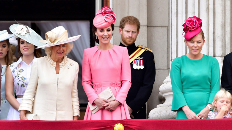 Kate Middleton in pink outfit smiling