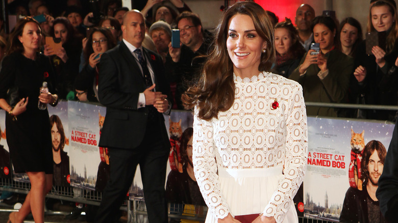 Kate Middleton smiling on red carpet