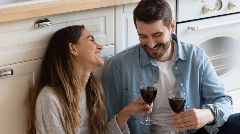 couple on floor talking