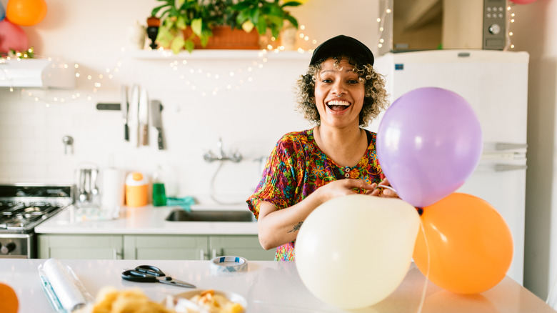 woman decorating for party