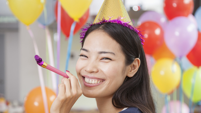 woman wearing party hat 