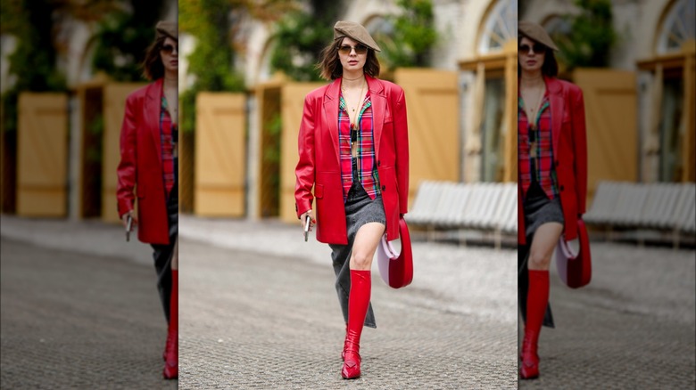 woman wearing red knee-high socks