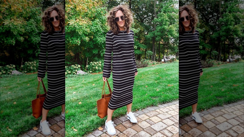 Girl wearing a casual striped knit maxi dress