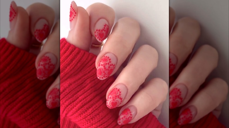 Red lace nails manicure
