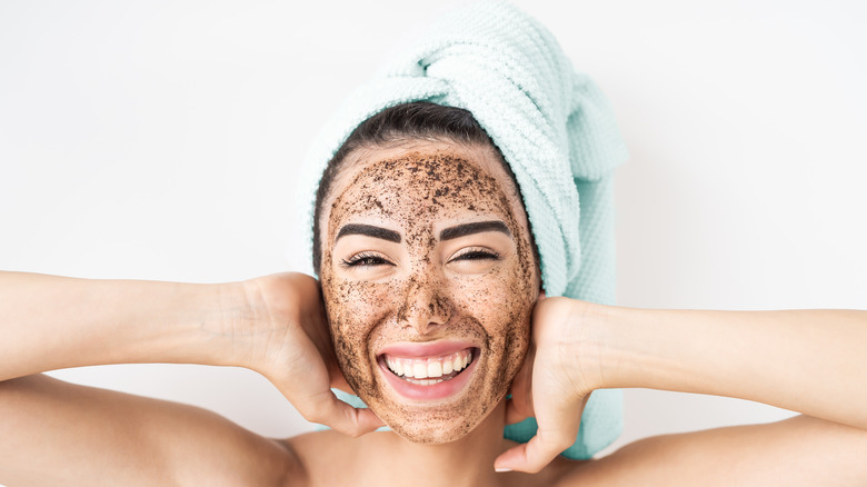 woman wearing exfoliator face mask