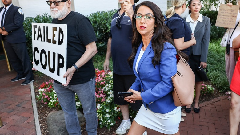 Lauren Boebert in a white minidress and blue blazer