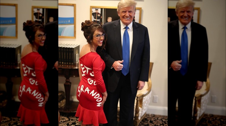 Lauren Boebert wearing her "Let's Go Brandon" dress while posing with Donald Trump