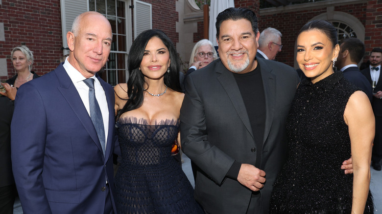 Lauren Sánchez wearing a low-cut gown beside other attendees at the Bezos Courage and Civility Awards.