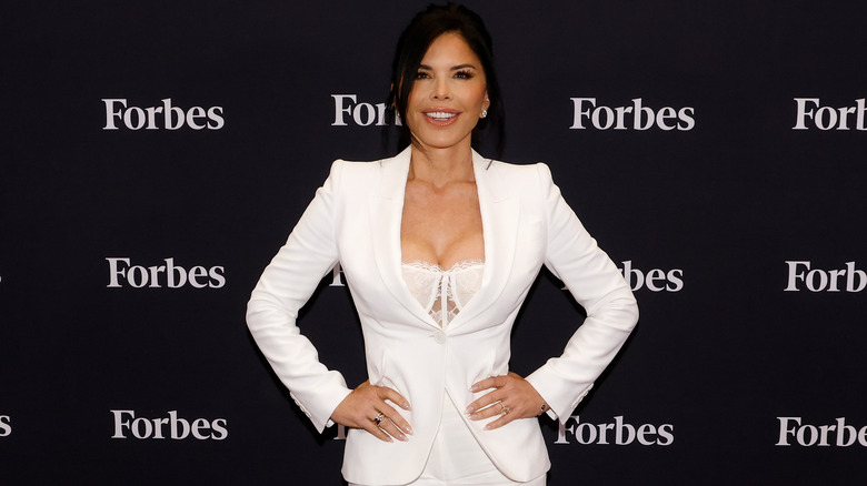 Lauren Sánchez wearing a white bra and blazer at the 2024 Forbes Power Women's Summit.