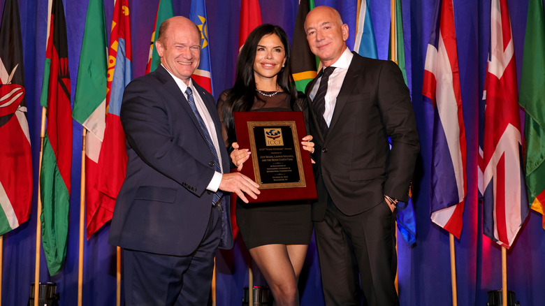 Lauren Sánchez accepting an ICCF award with Jeff Bezos.