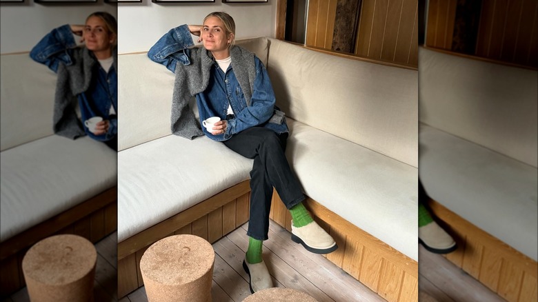 woman in T-shirt and denim button-up