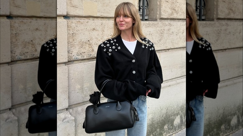 woman in black cardigan 