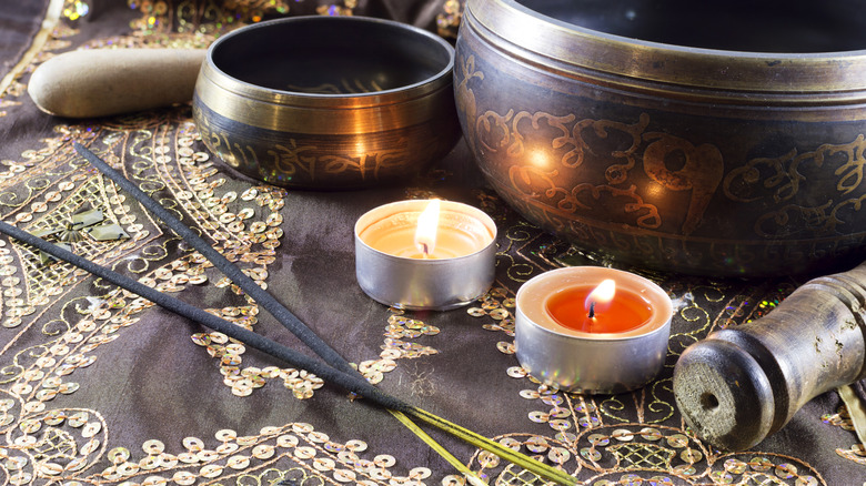 Candles, incense, and singing prayer bowls