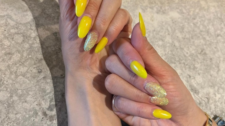 yellow manicure with shimmer