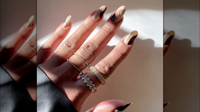 iced coffee nails with golden swirl