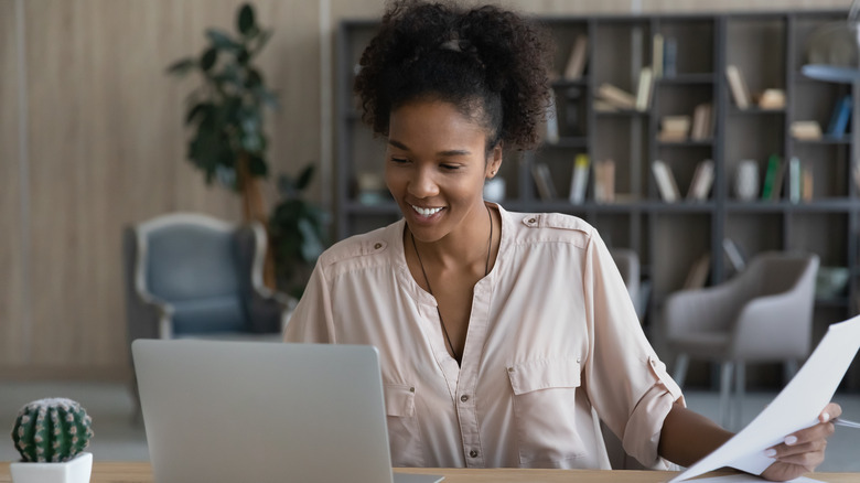 Young woman working at desk