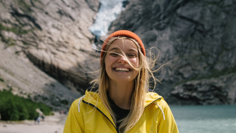 Smiling woman on glacier hike