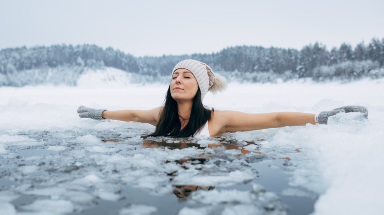 Peaceful woman ice swimming