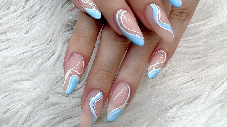 White, light blue, clear manicure design
