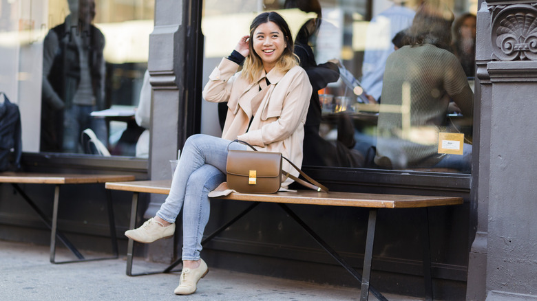 Alison Cuan wearing light-wash skinny jeans