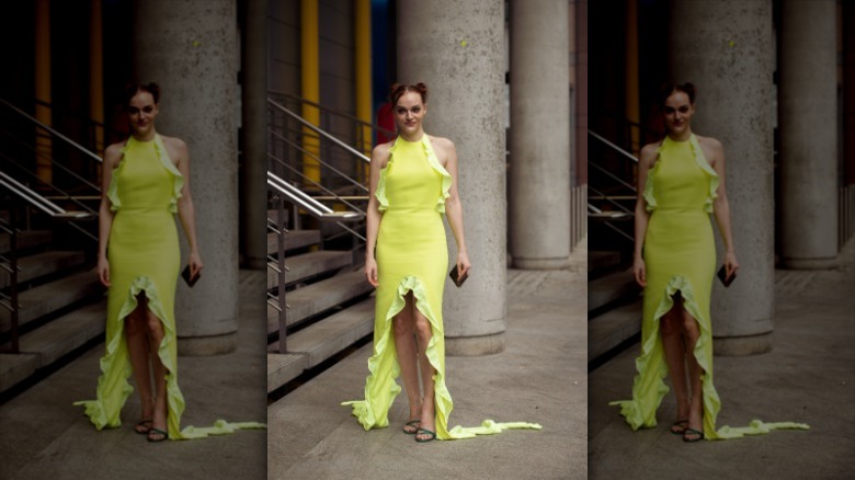 woman wearing ruffled lime green dress