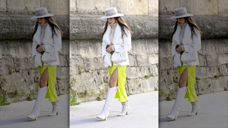 woman wearing lime green satin skirt