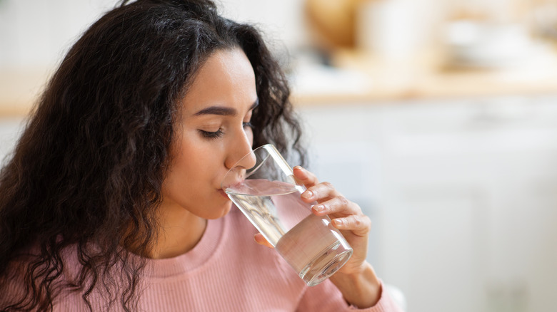 A woman drinking water