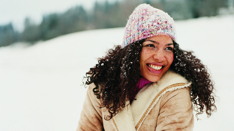 Woman smiling in the snow