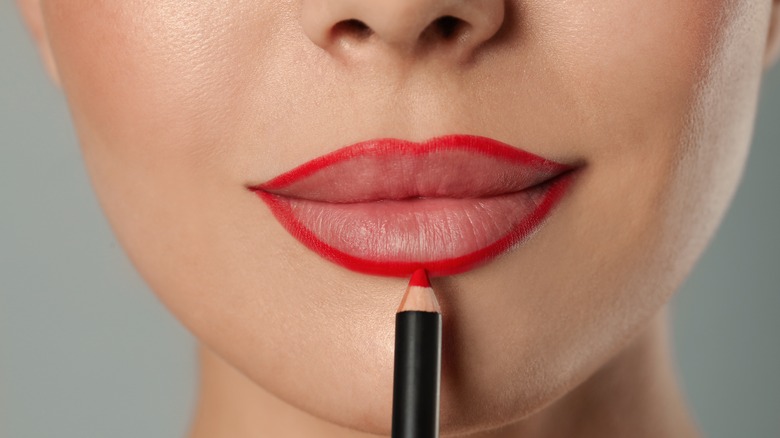 Woman's lips with lip liner