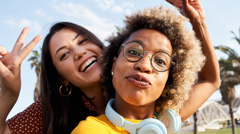 happy women posing for selfie