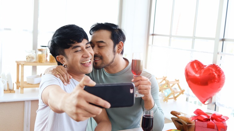 Couple taking selfie on date