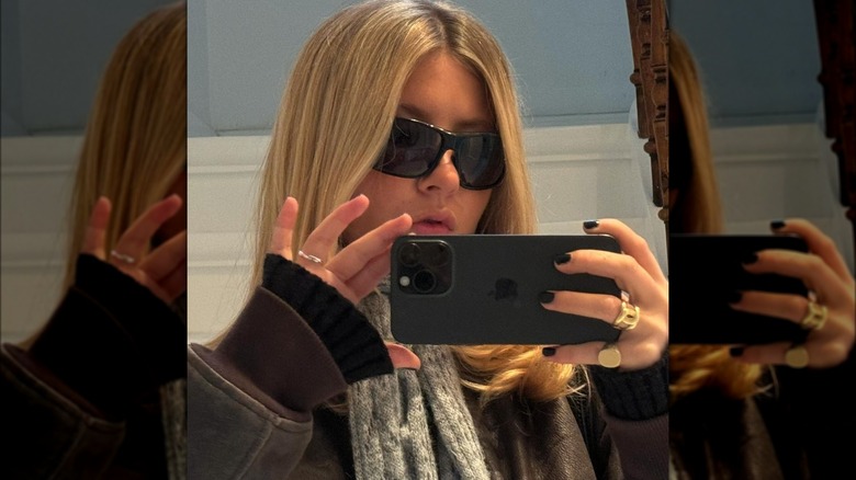Pouty blonde woman dark sunglasses