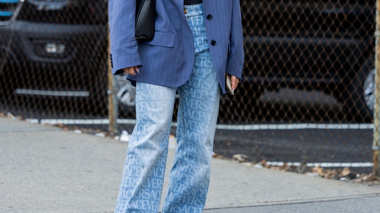 woman wearing Versace jeans