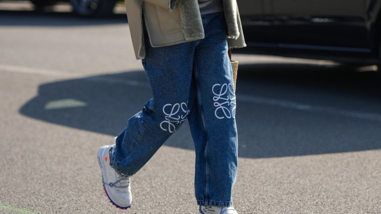 woman wearing Loewe jeans