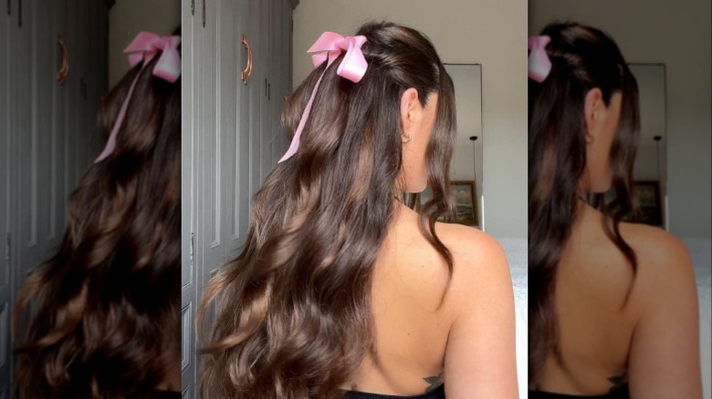 Woman wearing a pink bow 