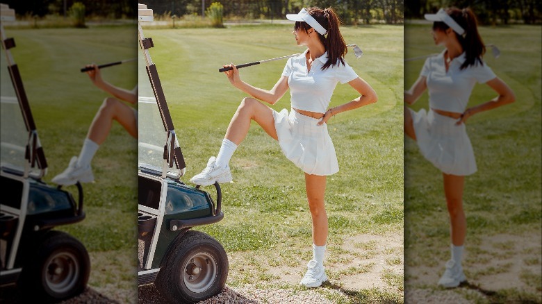 woman wearing skort and polo shirt